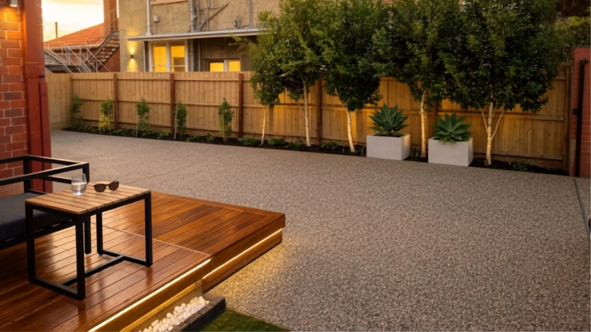 Exposed aggregate driveway and deck area completed by Lunar Concrete Solutions
